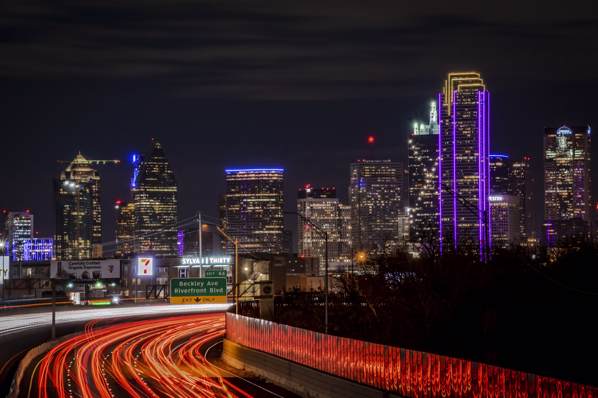 Dallas downtown skyline reflected in the Trinity River at golden hour