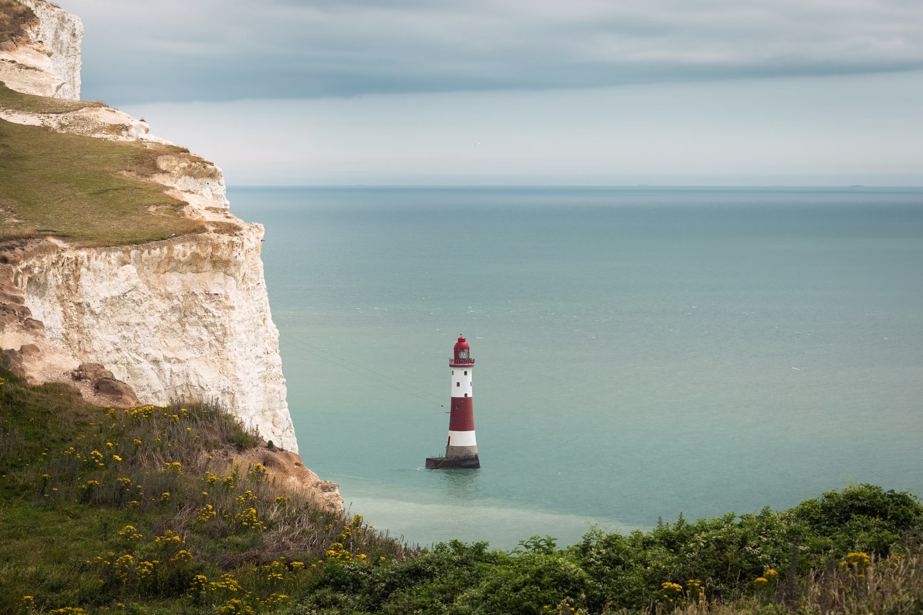 Chalk cliffs and lighthouse on the southern English coastline, United Kingdom